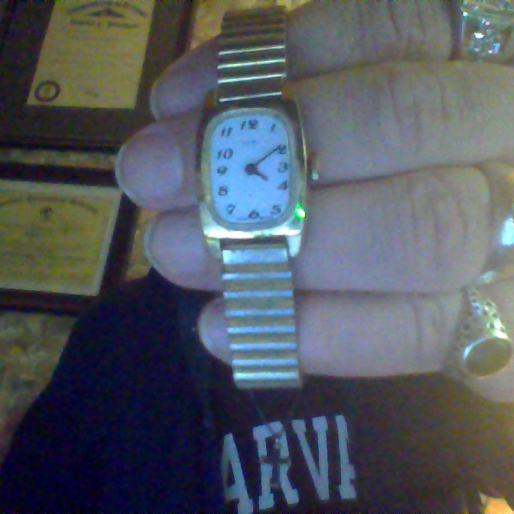 ladies gold tone Timex with oyster clasp